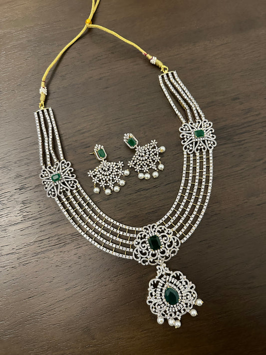 5 layer long AD stone necklace set with green stone highlights and matching earrings