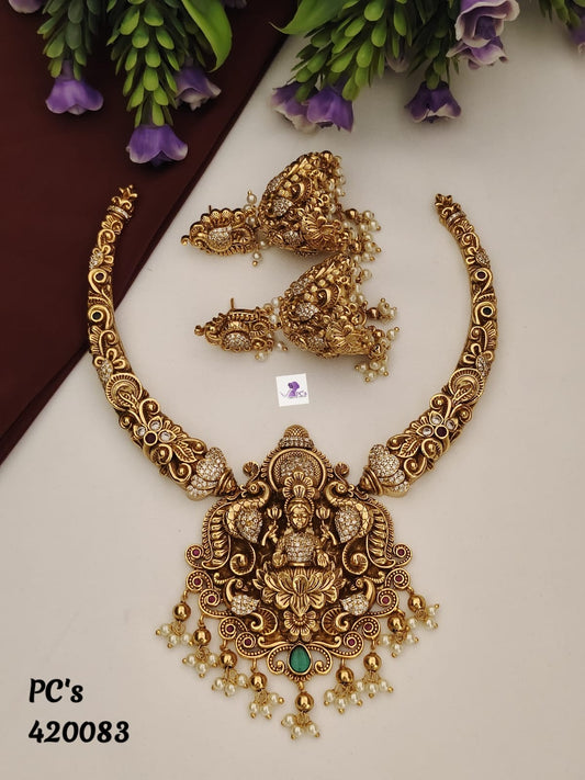 Lakshmi Hasli set with pretty Jhumkas